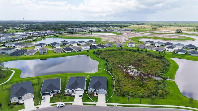 6435 165th Dr E, Parrish, FL 34219 - aerial view of residential area with a large body of water