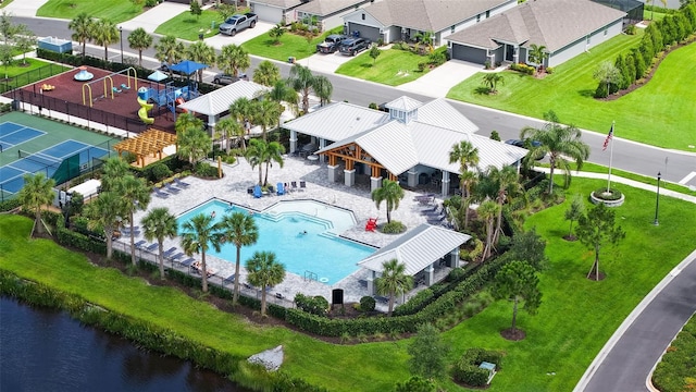 6435 165th Dr E, Parrish, FL 34219 - aerial view of residential area featuring a pool area and a large body of water