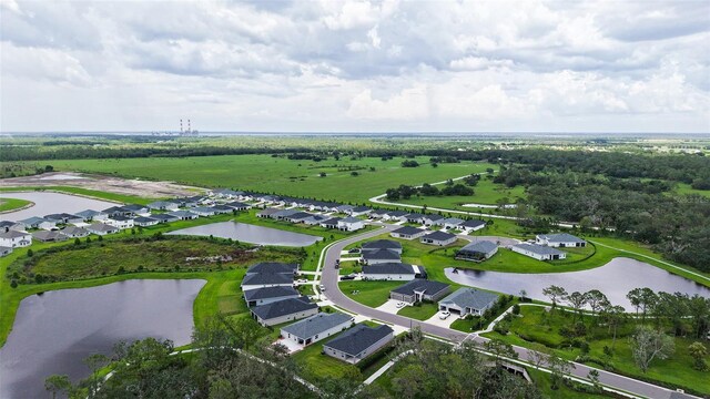 6435 165th Dr E, Parrish, FL 34219 - aerial view of property and surrounding area with a nearby body of water and nearby suburban area