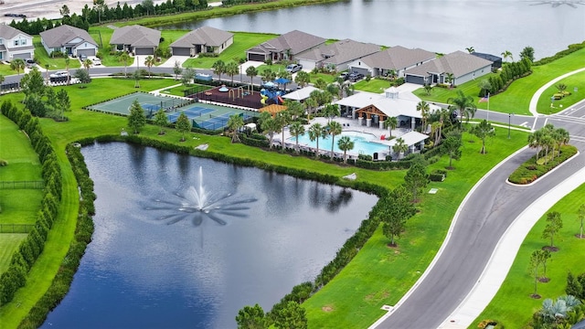 6435 165th Dr E, Parrish, FL 34219 - aerial perspective of suburban area with a nearby body of water and a pool area