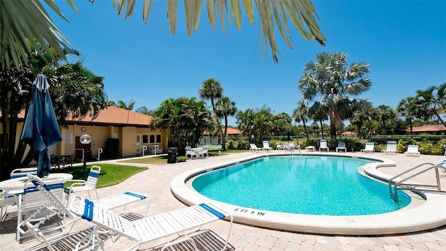 3305 Notre Dame Pl Unit 3305, Bradenton, FL 34207 - community pool featuring a patio area
