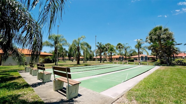 3305 Notre Dame Pl Unit 3305, Bradenton, FL 34207 - surrounding community featuring a lawn and shuffleboard