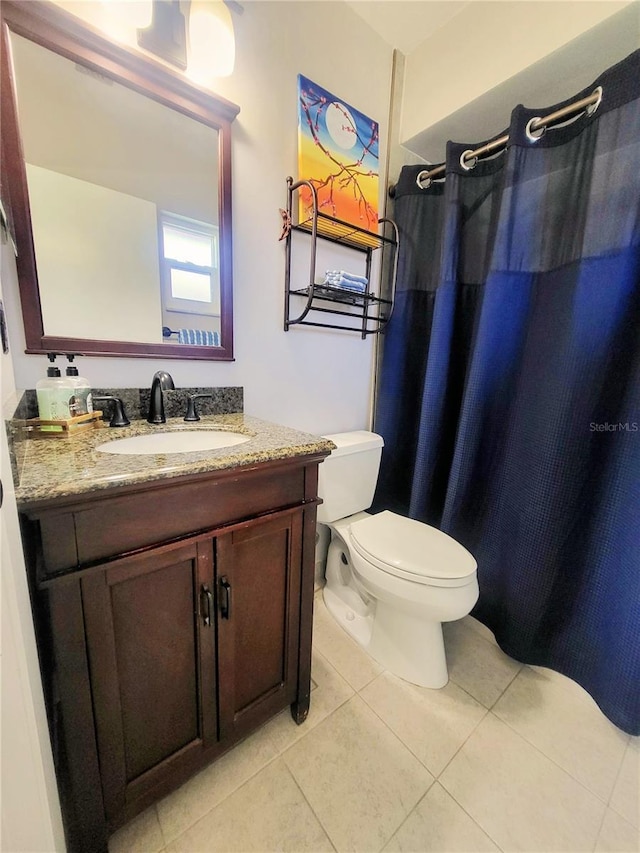 3305 Notre Dame Pl Unit 3305, Bradenton, FL 34207 - full bath with a shower with curtain, vanity, and tile patterned flooring