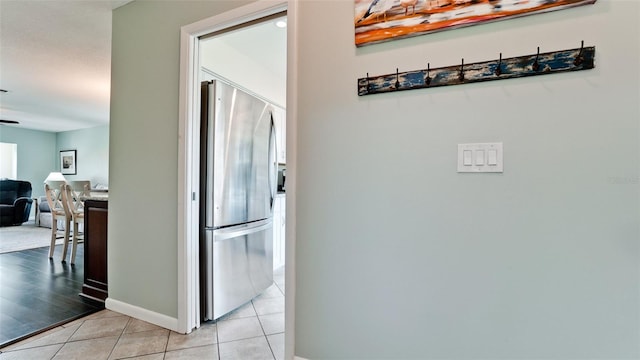 3305 Notre Dame Pl Unit 3305, Bradenton, FL 34207 - hall with light tile patterned floors and baseboards