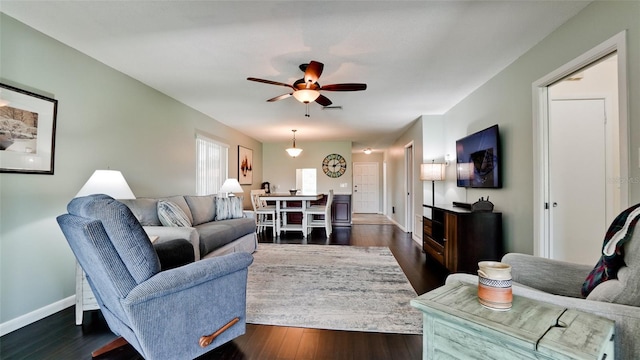 3305 Notre Dame Pl Unit 3305, Bradenton, FL 34207 - living room featuring dark wood finished floors and a ceiling fan