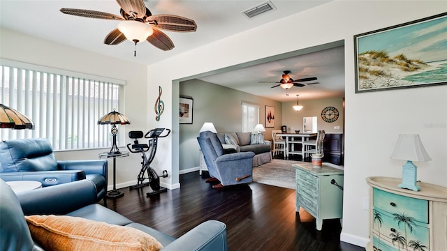 3305 Notre Dame Pl Unit 3305, Bradenton, FL 34207 - living area featuring a ceiling fan and dark wood-style flooring