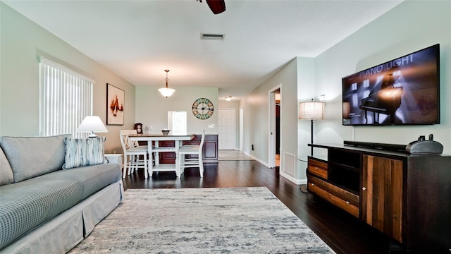 3305 Notre Dame Pl Unit 3305, Bradenton, FL 34207 - living room featuring dark wood finished floors and ceiling fan