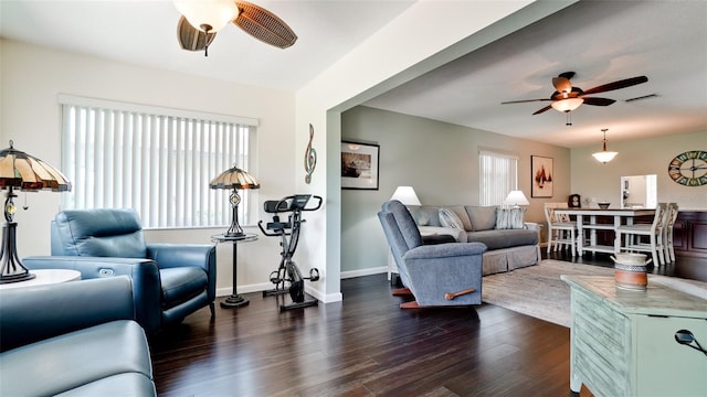 3305 Notre Dame Pl Unit 3305, Bradenton, FL 34207 - living room with a ceiling fan and dark wood-type flooring