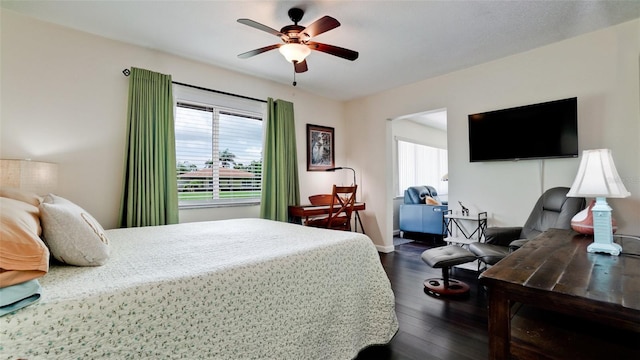 3305 Notre Dame Pl Unit 3305, Bradenton, FL 34207 - bedroom featuring multiple windows, dark wood-type flooring, and ceiling fan