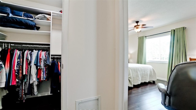 3305 Notre Dame Pl Unit 3305, Bradenton, FL 34207 - bedroom with a closet, wood finished floors, and a walk in closet