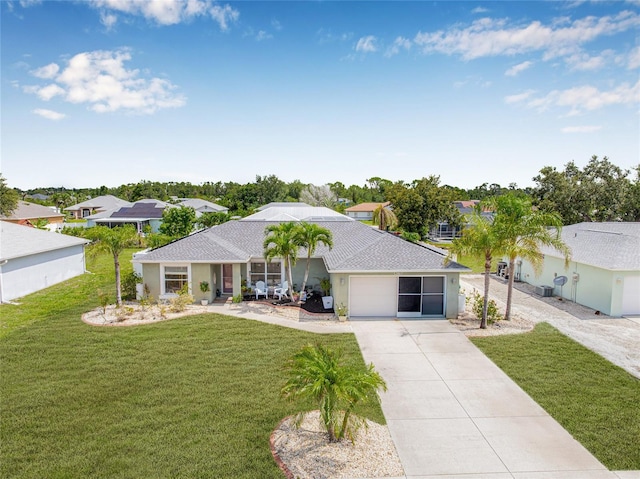 6178 Coliseum Blvd, Port Charlotte, FL 33981 - ranch-style home with driveway, a front yard, a shingled roof, and a residential view