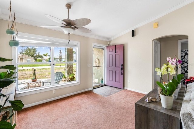 6178 Coliseum Blvd, Port Charlotte, FL 33981 - carpeted foyer entrance featuring arched walkways, crown molding, ceiling fan, and lofted ceiling