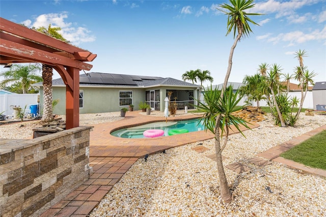 6178 Coliseum Blvd, Port Charlotte, FL 33981 - view of pool with a sunroom, a patio, and a fenced backyard
