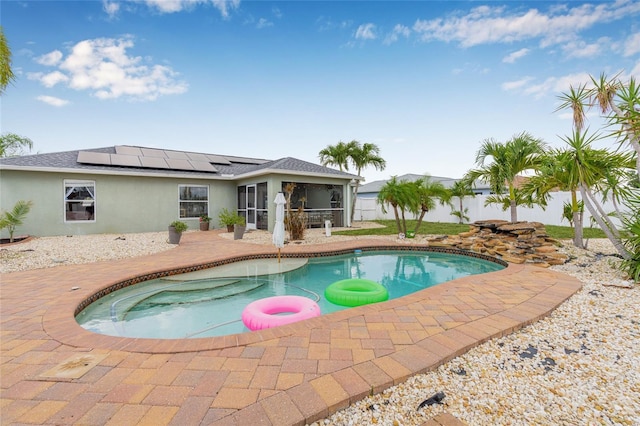6178 Coliseum Blvd, Port Charlotte, FL 33981 - view of swimming pool with a sunroom, a fenced backyard, and a patio