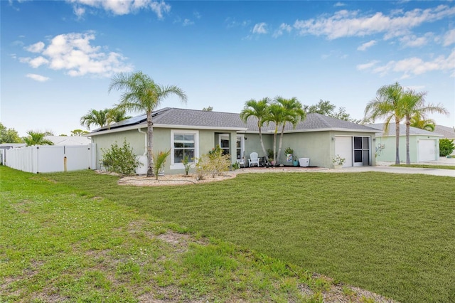 6178 Coliseum Blvd, Port Charlotte, FL 33981 - view of front of house with roof mounted solar panels and stucco siding