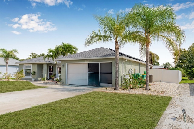 6178 Coliseum Blvd, Port Charlotte, FL 33981 - ranch-style house featuring stucco siding, driveway, an attached garage, and roof with shingles