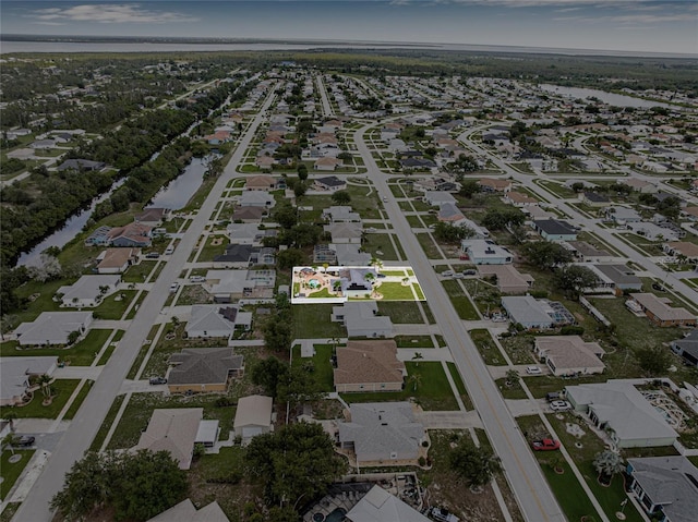 6178 Coliseum Blvd, Port Charlotte, FL 33981 - aerial perspective of suburban area with a large body of water