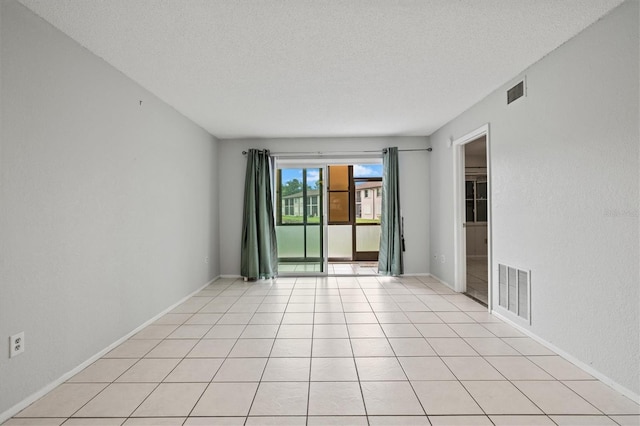25100 Sandhill Blvd Unit 104G, Punta Gorda, FL 33983 - spare room with a textured ceiling and baseboards