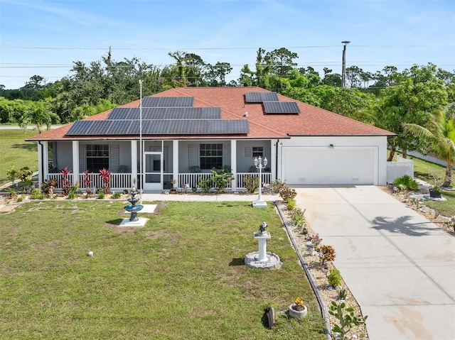 25324 Alicante Dr, Punta Gorda, FL 33955 - single story home with covered porch, a garage, a front yard, and concrete driveway
