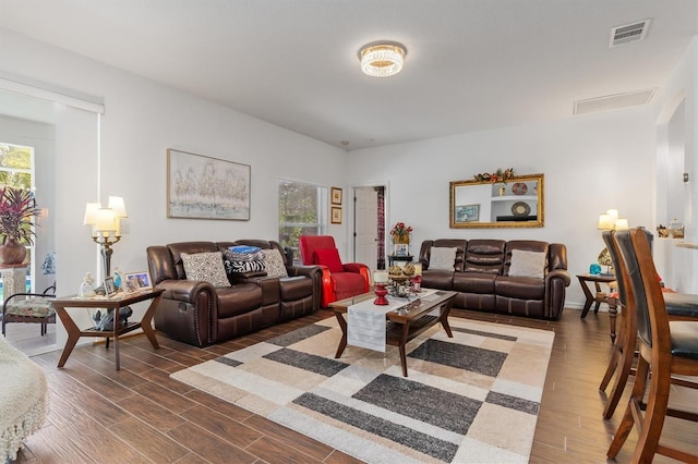 25324 Alicante Dr, Punta Gorda, FL 33955 - living room featuring plenty of natural light and wood finished floors