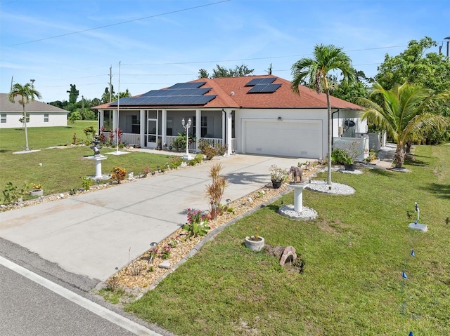 25324 Alicante Dr, Punta Gorda, FL 33955 - single story home featuring solar panels, driveway, an attached garage, and a shingled roof
