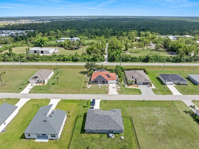 25324 Alicante Dr, Punta Gorda, FL 33955 - aerial view of residential area with a heavily wooded area