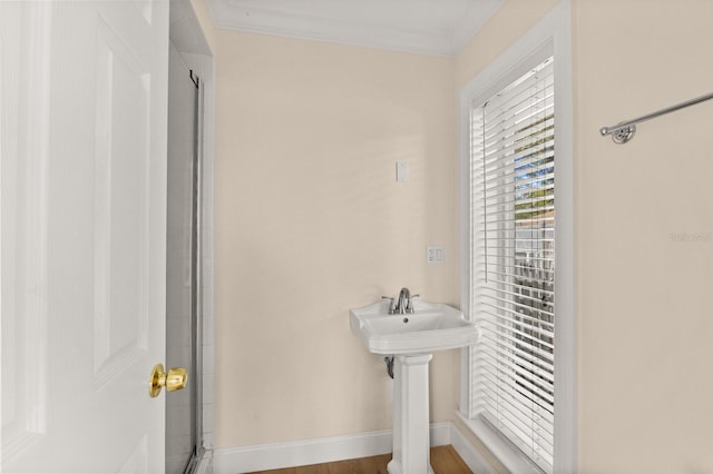 2401 Riverview Blvd, Bradenton, FL 34205 - full bathroom featuring an enclosed shower and ornamental molding
