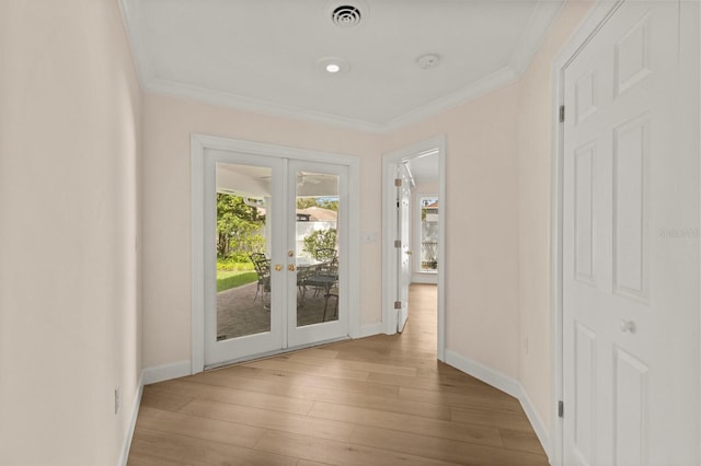 2401 Riverview Blvd, Bradenton, FL 34205 - doorway featuring french doors, hardwood / wood-style floors, and crown molding