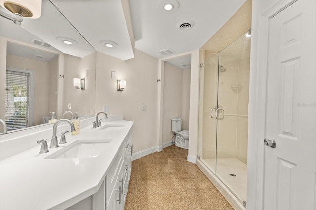 2401 Riverview Blvd, Bradenton, FL 34205 - bathroom featuring double vanity, a stall shower, and recessed lighting
