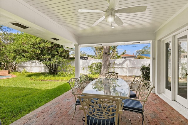 2401 Riverview Blvd, Bradenton, FL 34205 - view of patio featuring ceiling fan and outdoor dining space
