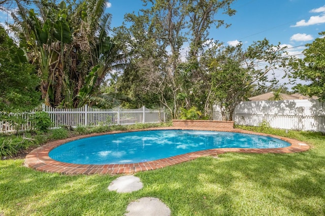 2401 Riverview Blvd, Bradenton, FL 34205 - view of swimming pool featuring a fenced backyard