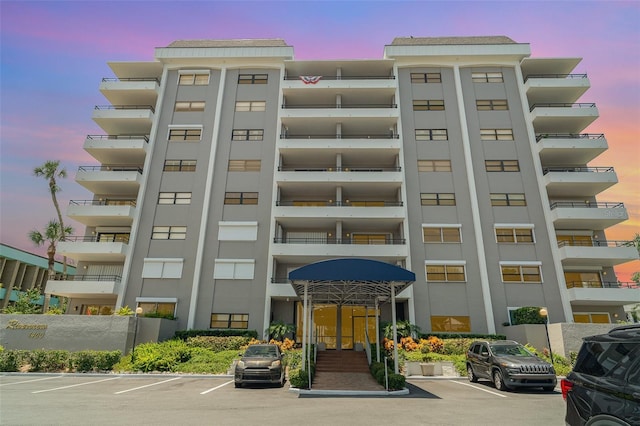 1400 1st Ave W Unit 103, Bradenton, FL 34205 - property at dusk with uncovered parking