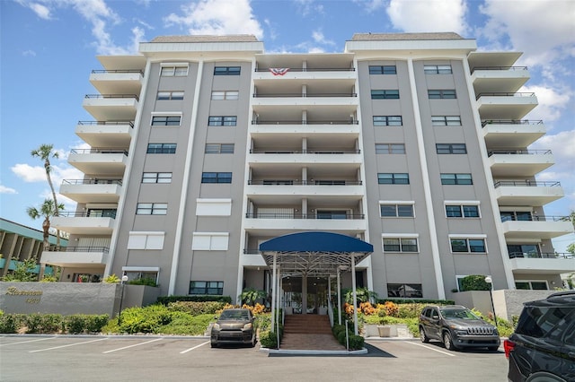 1400 1st Ave W Unit 103, Bradenton, FL 34205 - view of apartment building / complex with uncovered parking