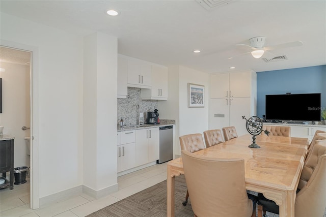 1400 1st Ave W Unit 103, Bradenton, FL 34205 - dining room with a ceiling fan, light tile patterned floors, and recessed lighting