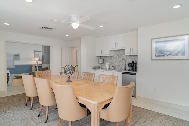 1400 1st Ave W Unit 103, Bradenton, FL 34205 - dining room with ceiling fan, recessed lighting, and light tile patterned floors