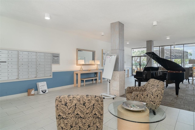 1400 1st Ave W Unit 103, Bradenton, FL 34205 - living area with mail area and baseboards