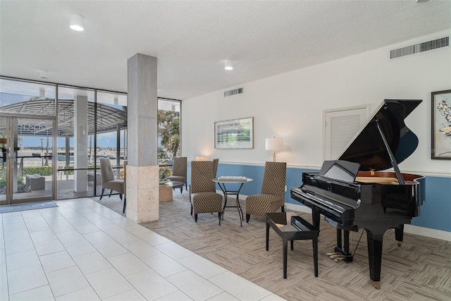 1400 1st Ave W Unit 103, Bradenton, FL 34205 - community lobby with a wall of windows