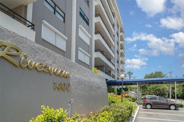 1400 1st Ave W Unit 103, Bradenton, FL 34205 - view of building exterior with uncovered parking