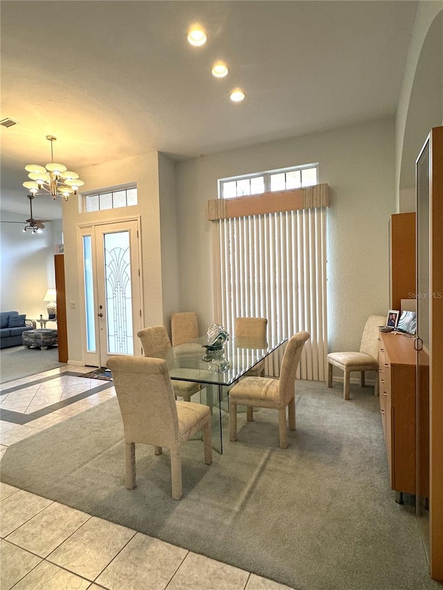 8616 15th Ave NW, Bradenton, FL 34209 - tiled dining space featuring a chandelier and recessed lighting
