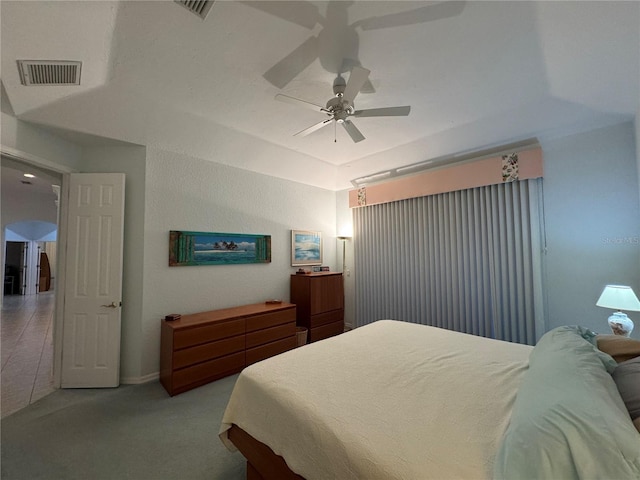 8616 15th Ave NW, Bradenton, FL 34209 - carpeted bedroom featuring a raised ceiling and a ceiling fan