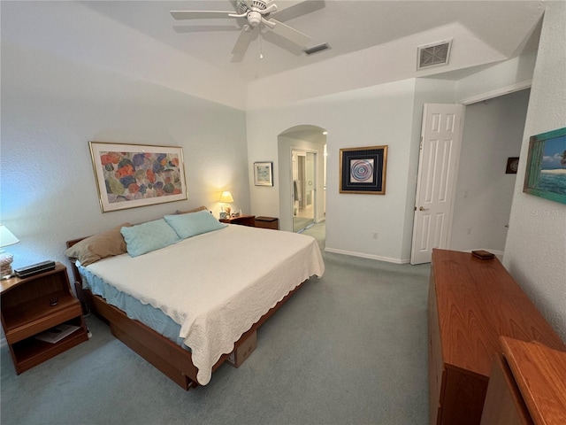 8616 15th Ave NW, Bradenton, FL 34209 - bedroom with arched walkways, carpet flooring, ensuite bathroom, and ceiling fan