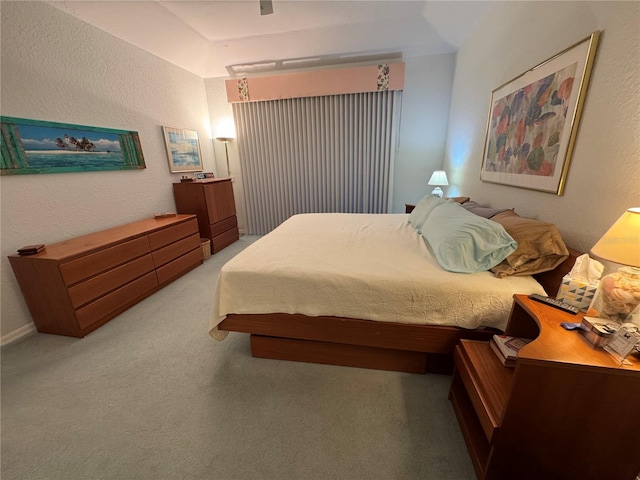 8616 15th Ave NW, Bradenton, FL 34209 - bedroom with light carpet and a textured wall
