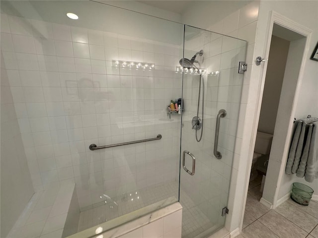 8616 15th Ave NW, Bradenton, FL 34209 - bathroom with a shower stall and tile patterned floors