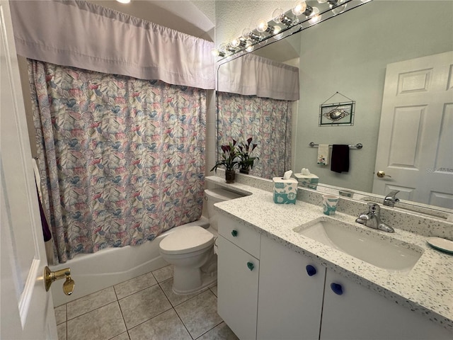 8616 15th Ave NW, Bradenton, FL 34209 - full bath featuring vanity, tile patterned floors, and shower / bath combo with shower curtain