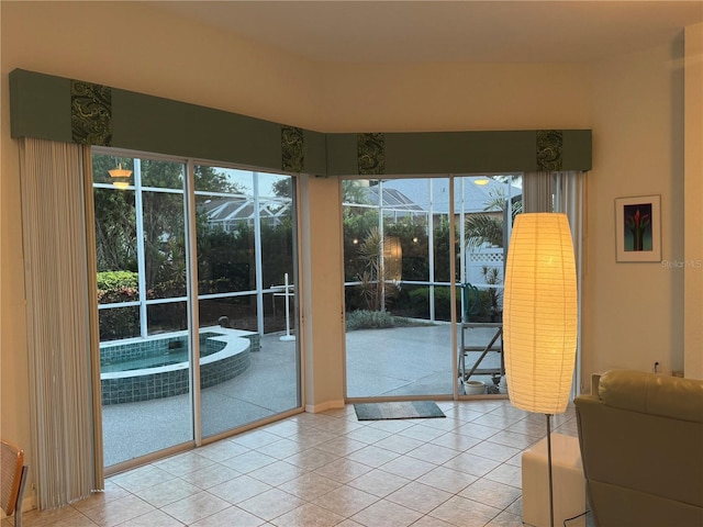 8616 15th Ave NW, Bradenton, FL 34209 - doorway to outside featuring tile patterned floors and healthy amount of natural light