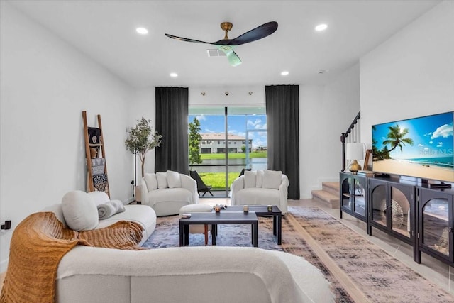 15131 Sunny Day Dr, Bradenton, FL 34211 - living room with stairway, ceiling fan, and recessed lighting