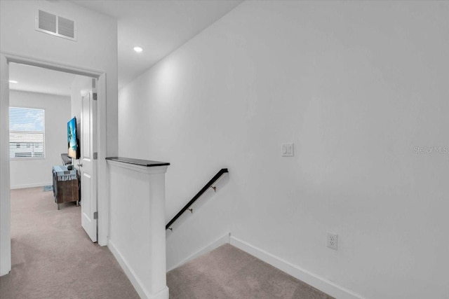 15131 Sunny Day Dr, Bradenton, FL 34211 - corridor with an upstairs landing, light colored carpet, and recessed lighting