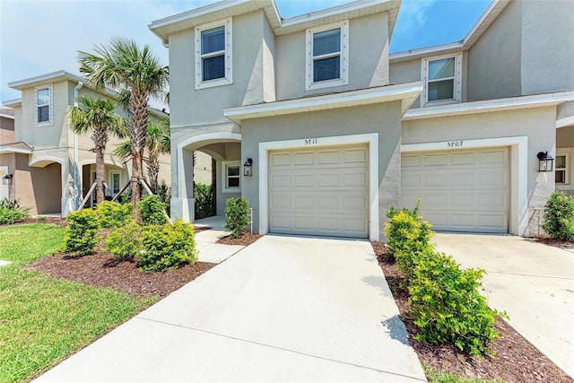 5711 Archipelago St, Nokomis, FL 34275 - multi unit property with stucco siding, a garage, and driveway