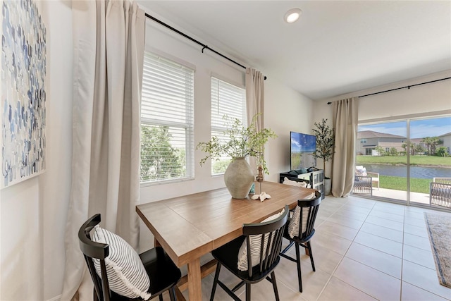 5711 Archipelago St, Nokomis, FL 34275 - dining space with plenty of natural light, light tile patterned floors, and recessed lighting