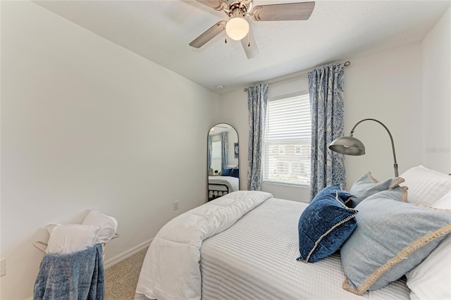 5711 Archipelago St, Nokomis, FL 34275 - carpeted bedroom with a ceiling fan and baseboards